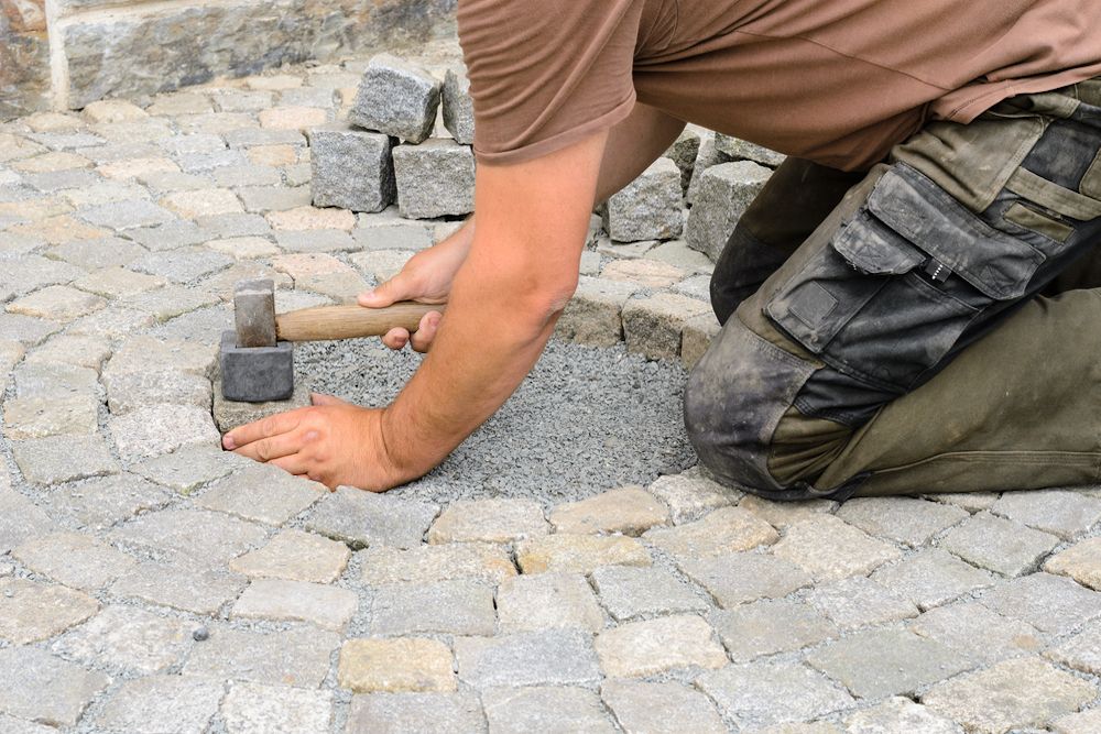 como colocar piedra natural en el suelo